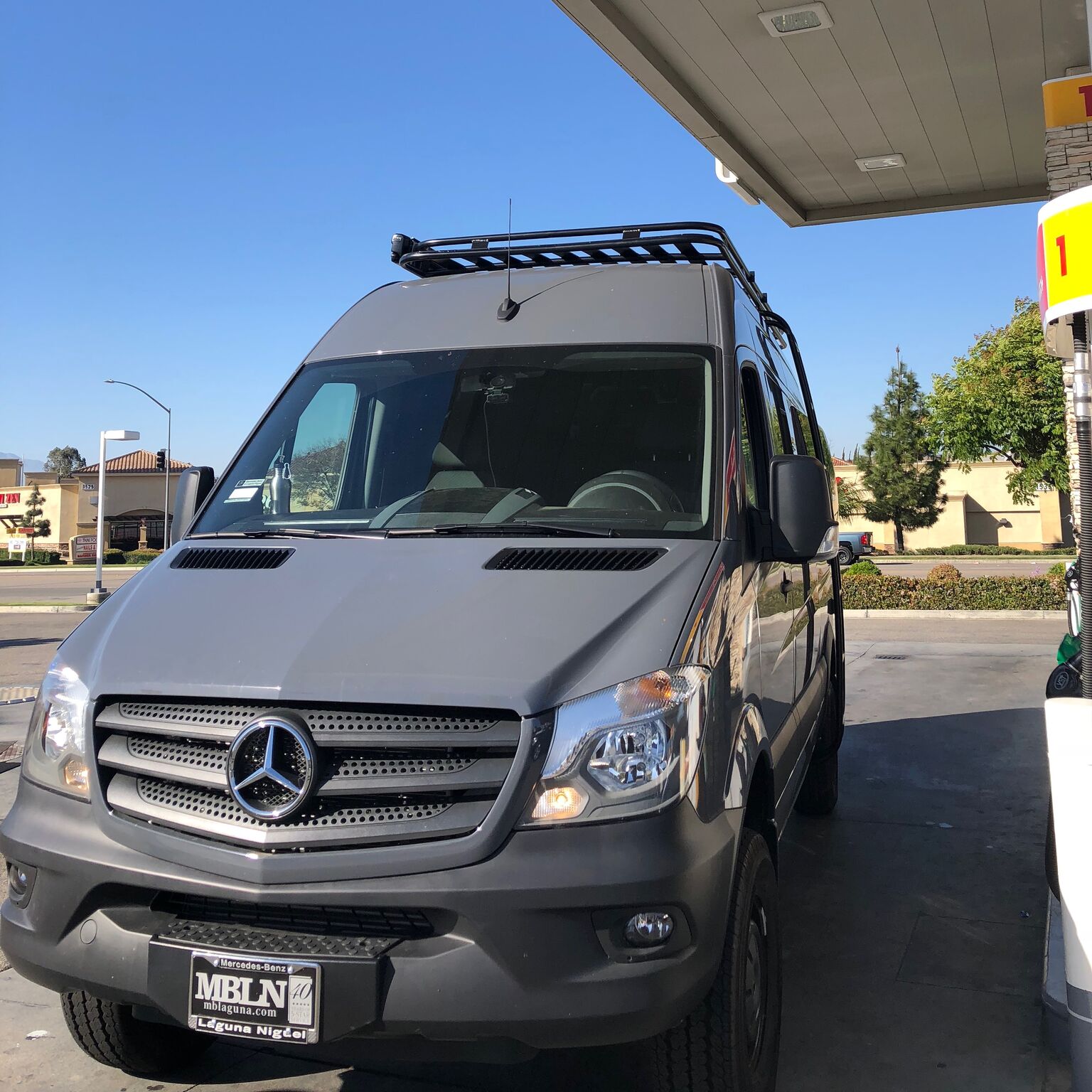 Mercedes sprinter van parked at the gas station