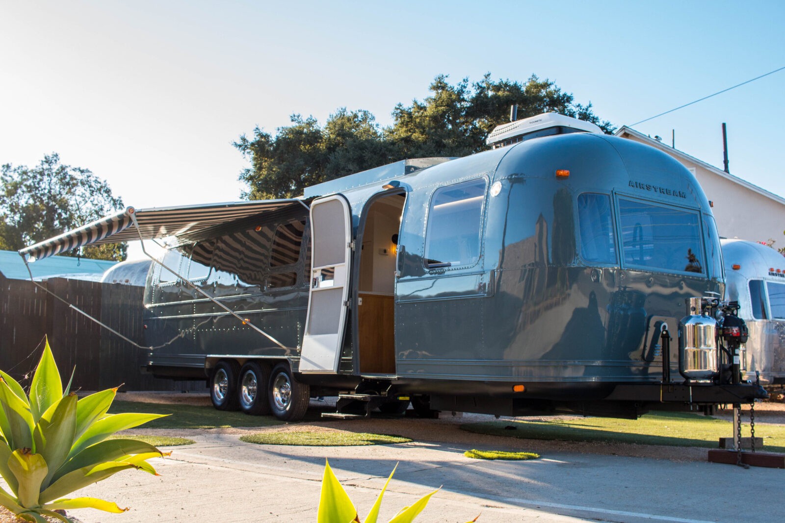 Exterior view of the steely blue shell Airstream