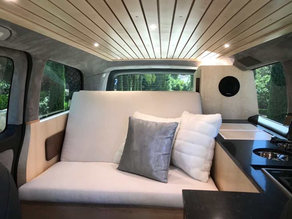 interior of a van with sofa and cushions