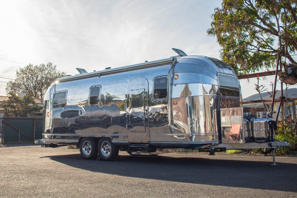 Side view of the Vintage Silver Lining Airstream Trailer