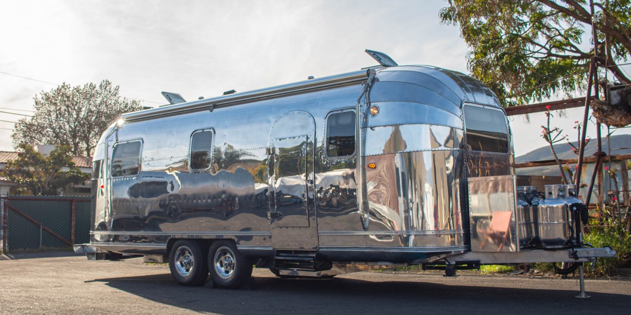 Side view of the Vintage Silver Lining Airstream Trailer