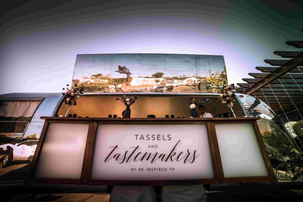 A close-up shot of the Tassels and Tastemakers Banner